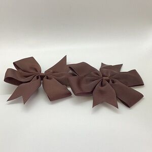 Handmade custom bows for any occasion. Sizes vary.